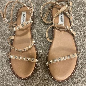 Steve Madden Travel sandals. Tan straps with silver studded hardware.